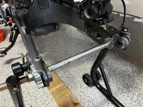 Looking at the swing arm with spindle mounted back on the bike, but without the rear wheel